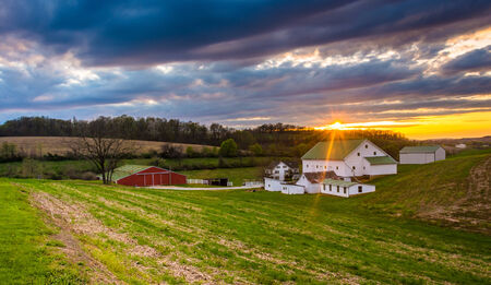 Sunset over a farm in rural York County, Pennsylvania.の写真素材