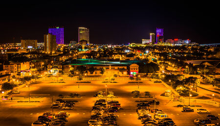 Streets and distant casinos at night in Atlantic City, New Jersey.のeditorial素材