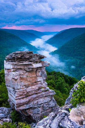 Fog in the Blackwater Canyon at sunset, seen from Lindy Point, Blackwater Falls State Park, West Virginia.の写真素材