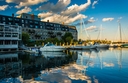 Lewis Wharf and boats reflecting in the Boston Inner Harbor, in Boston, Massachusetts.のeditorial素材