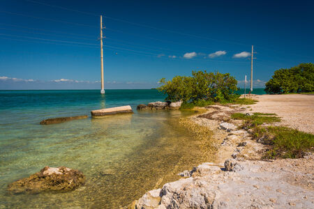 Turquoise waters and power lines in the Gulf of Mexico, seen from Islamorada.の写真素材