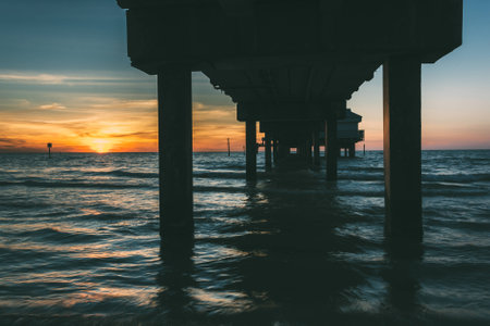 Fishing pier in the Gulf of Mexico at sunset,  Clearwater Beach, Florida.の写真素材