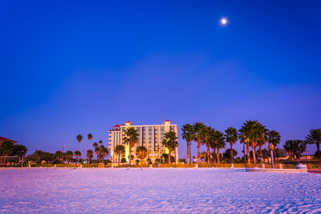 Moon over hotel and the beach at night in Clearwater Beach, Florida.のeditorial素材