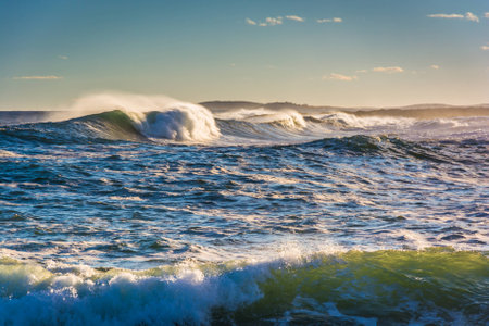 Large waves in the Atlantic Ocean seen from Pemaquid Point, Maine.の写真素材