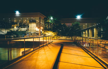 Elevated walkway and buildings at night in Baltimore, Maryland.の写真素材