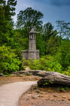 Storm clouds over the castle on Little Round Top in Gettysburg, Pennsylvania.の写真素材