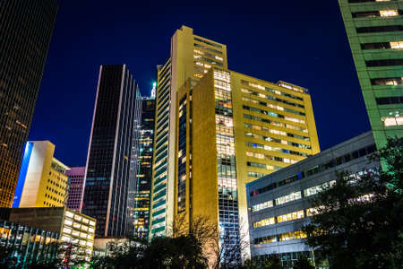 Cluster of skyscrapers at Thanks-Giving Square at night in Dallas, Texas.の写真素材