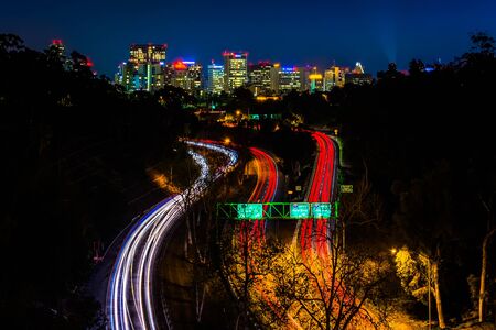 California Route 163 and the San Diego Skyline at night, seen from the Cabrillo Bridge, in San Diego, California.の写真素材