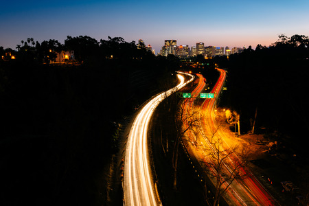 California Route 163 and the San Diego Skyline at night, seen from the Cabrillo Bridge, in San Diego, California.のeditorial素材