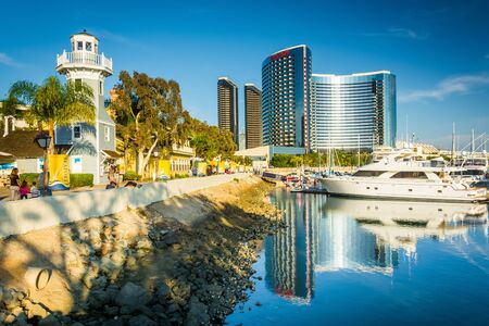 Marina and buildings reflecting at the Embarcadero in San Diego, California.のeditorial素材