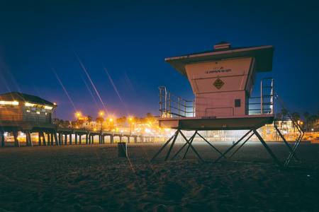 Lifeguard tower at night, in Huntington Beach, California.の写真素材