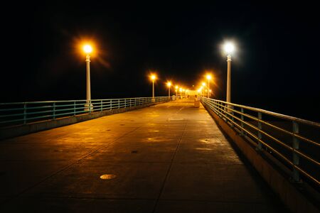 The pier at night, in Manhattan Beach, California.の写真素材