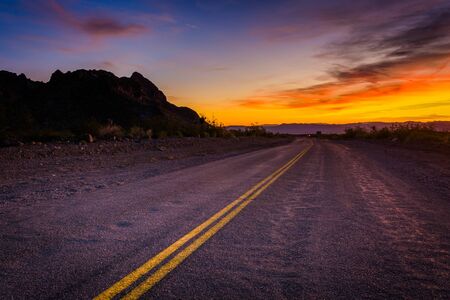 Historic Route 66 at sunset, in Oatman, Arizona.