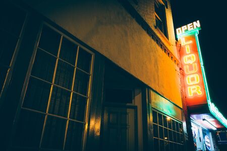 A liquor store at night, in Orange, California.のeditorial素材
