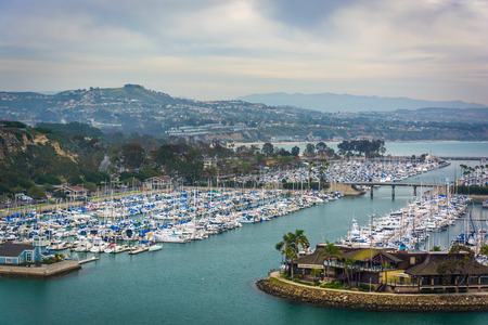 View of the harbor and a marina from Ken Sampson Overlook Park in Dana Point, California.のeditorial素材