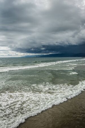 Storm clouds over the Pacific Ocean in Venice Beach, Los Angeles, California.の写真素材