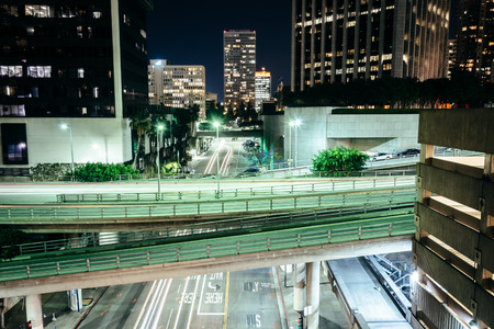 View of bridges over Flower Street at night, in downtown Los Angeles, California.の写真素材