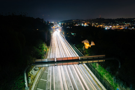 View of the 110 Freeway at night, from the Park Row Drive Bridge, in Los Angeles, California.の写真素材