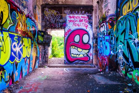 Graffiti under an abandoned pier in Philadelphia, Pennsylvania.のeditorial素材