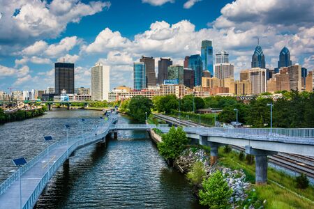 The skyline and Schuylkill Banks Boardwalk seen from the South Street Bridge over the Schuylkill River, in Philadelphia, Pennsylvania.のeditorial素材