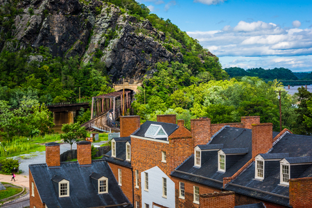 View of historic buildings and a railroad tunnel in Harpers Ferry, West Virginia.の写真素材