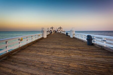 The pier at sunset in Malibu, California.の写真素材
