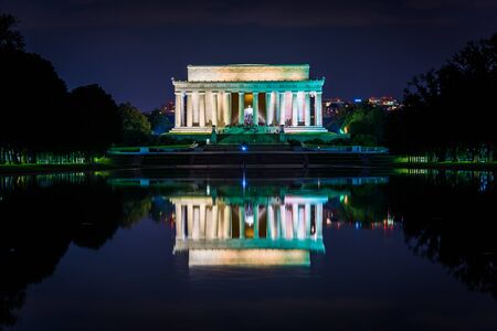 The Lincoln Memorial and Reflecting Pool at night, at the National Mall, in Washington, DC.