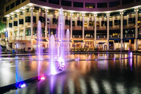 Fountains and buildings at night, in Georgetown, Washington, DC.のeditorial素材