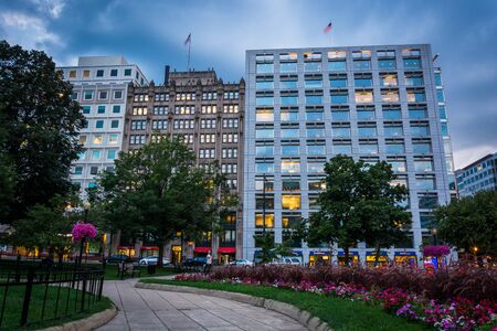 Garden and buildings seen at Farragut Square at twilight, in Washington, DC.のeditorial素材