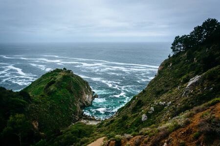 View of the Pacific Ocean from cliffs in Big Sur, California.の写真素材