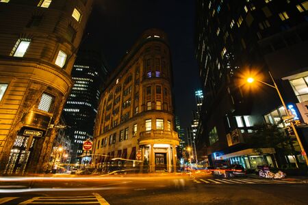 Intersection in the Financial District at night, in Lower Manhattan, New York.のeditorial素材