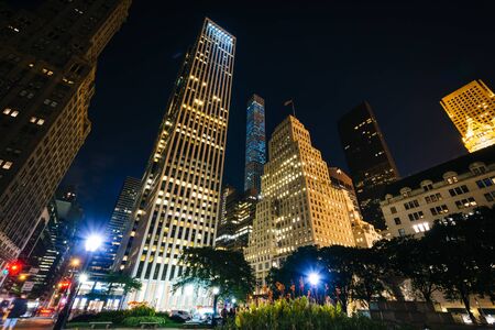 Skyscrapers in Midtown Manhattan at night, in New York.の写真素材