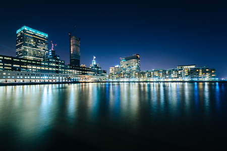 Buildings along the waterfront at night, in Jersey City, New Jersey.の写真素材