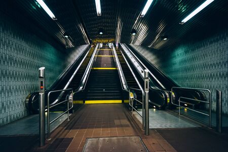 Escalators inside the Roosevelt Island Subway Station, in Manhattan, New York.のeditorial素材
