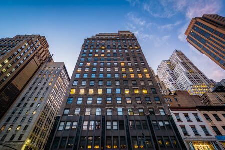 Buildings along 6th Avenue at twilight, in Midtown Manhattan, New York.のeditorial素材