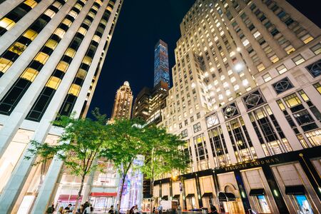 Skyscrapers in Midtown Manhattan at night, in New York.のeditorial素材