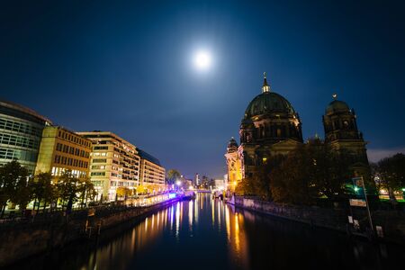 The Berlin Cathedral and the Spree at night, in Berlin, Germany.の写真素材
