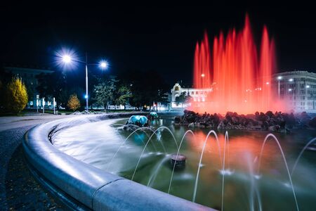 Fountains at Schwarzenbergplatz at night, in Vienna, Austria.の写真素材