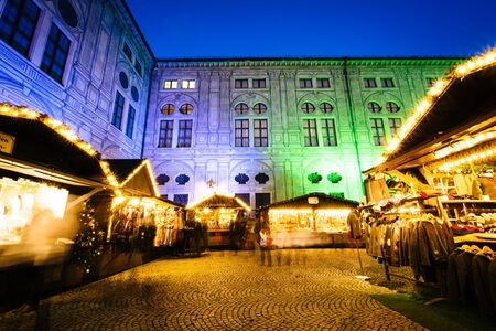 Christmas Market at night, at the Munich Residenz, in Munich, Germany.のeditorial素材