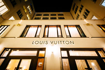 Louis Vuitton store at night, in Munich, Germany.のeditorial素材