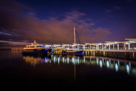 Pier in Manila Bay at night, in Pasay, Metro Manila, The Philippines.の写真素材