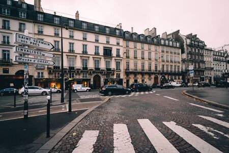 Buildings along Quai Voltaire, in Paris, France.のeditorial素材