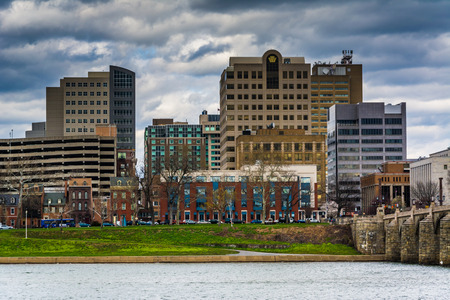 The Susquehanna River and buildings in downtown, in Harrisburg, Pennsylvania.の写真素材