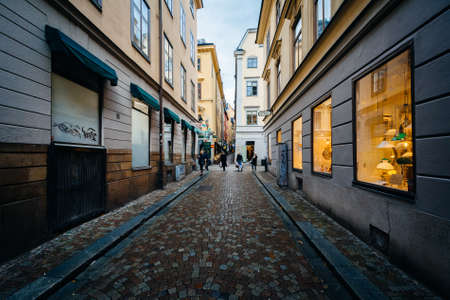 Narrow cobblestone street in Galma Stan, Stockholm, Sweden.のeditorial素材