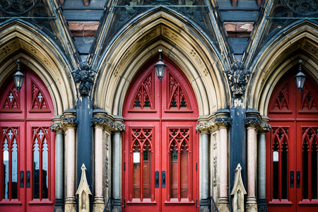 The red doors of Mount Vernon Place United Methodist Church, in Mount Vernon, Baltimore, Maryland.の写真素材