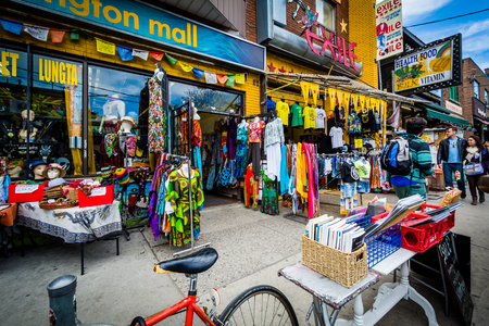 Businesses along Kensington Avenue, at Kensington Market in Toronto, Ontario.のeditorial素材