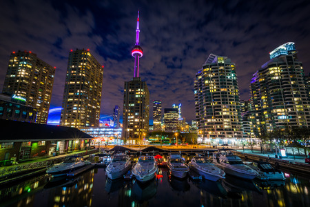 Marina and buildings at the Harbourfront at night, in Toronto, Ontario.のeditorial素材
