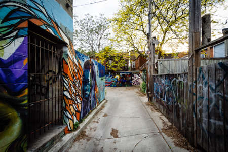 Graffiti in an alley in Kensington Market, Toronto, Ontario.のeditorial素材