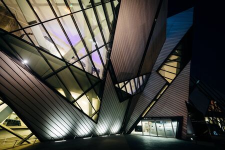 The exterior of the Royal Ontario Museum at night, in the Discovery District, Toronto, Ontario.のeditorial素材