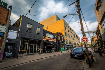 Businesses and intersection in Kensington Market, Toronto, Ontario.のeditorial素材
